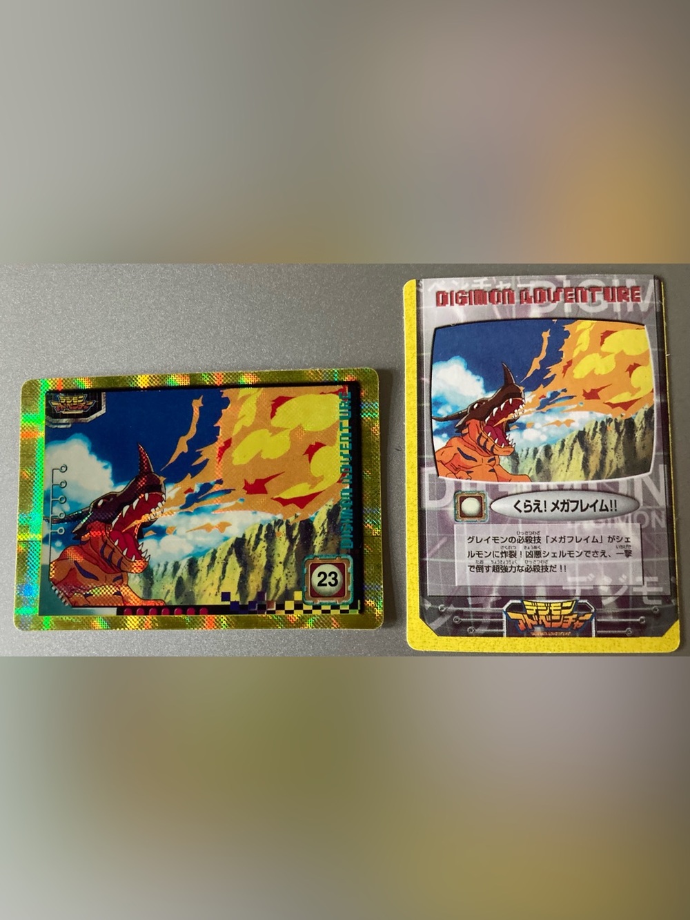 1999 Japanese Digimon Series 1 collectible card (No. 09) featuring Greymon